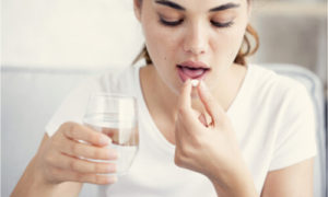The woman is taking antibiotics for 1 week.